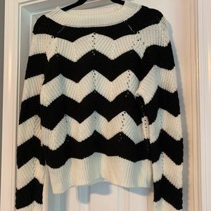 Black and off white sweater.